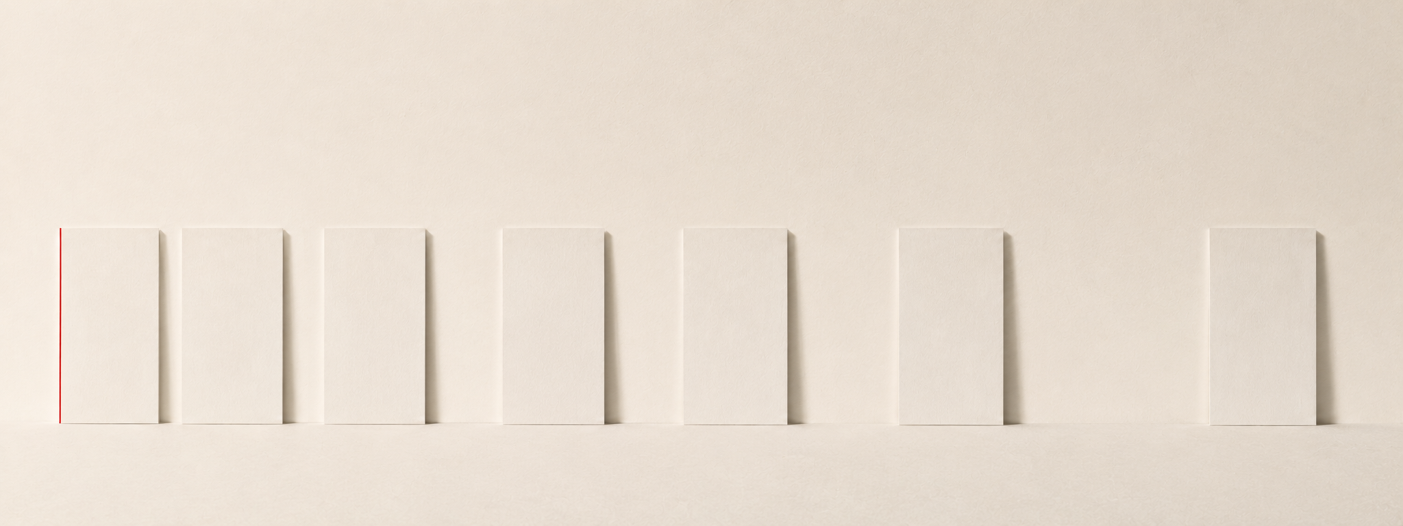 Paper cards in a row with progressively wider gaps